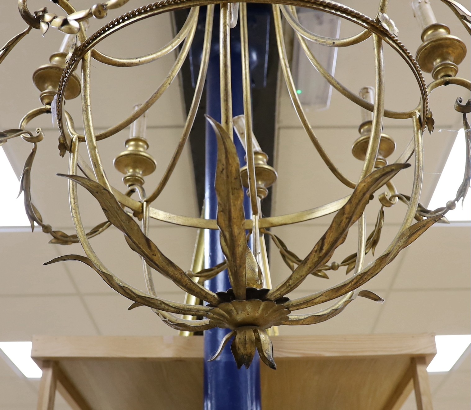 A gilt metal six light basket shaped ceiling chandelier